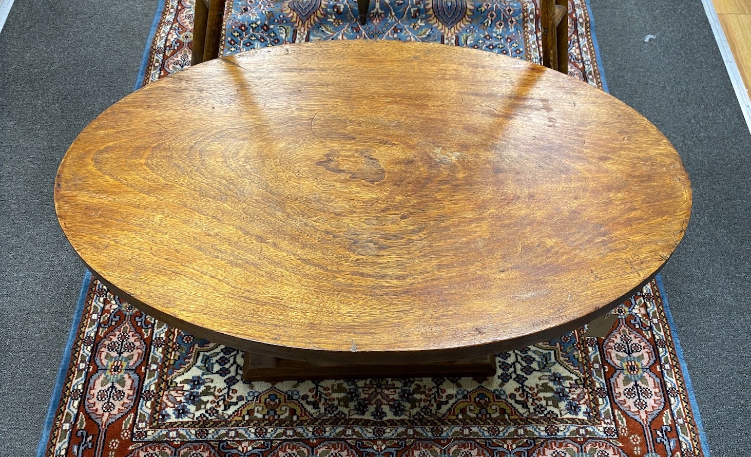 An African oval hardwood elephant occasional table, width 92cm, depth 58cm, height 51cm